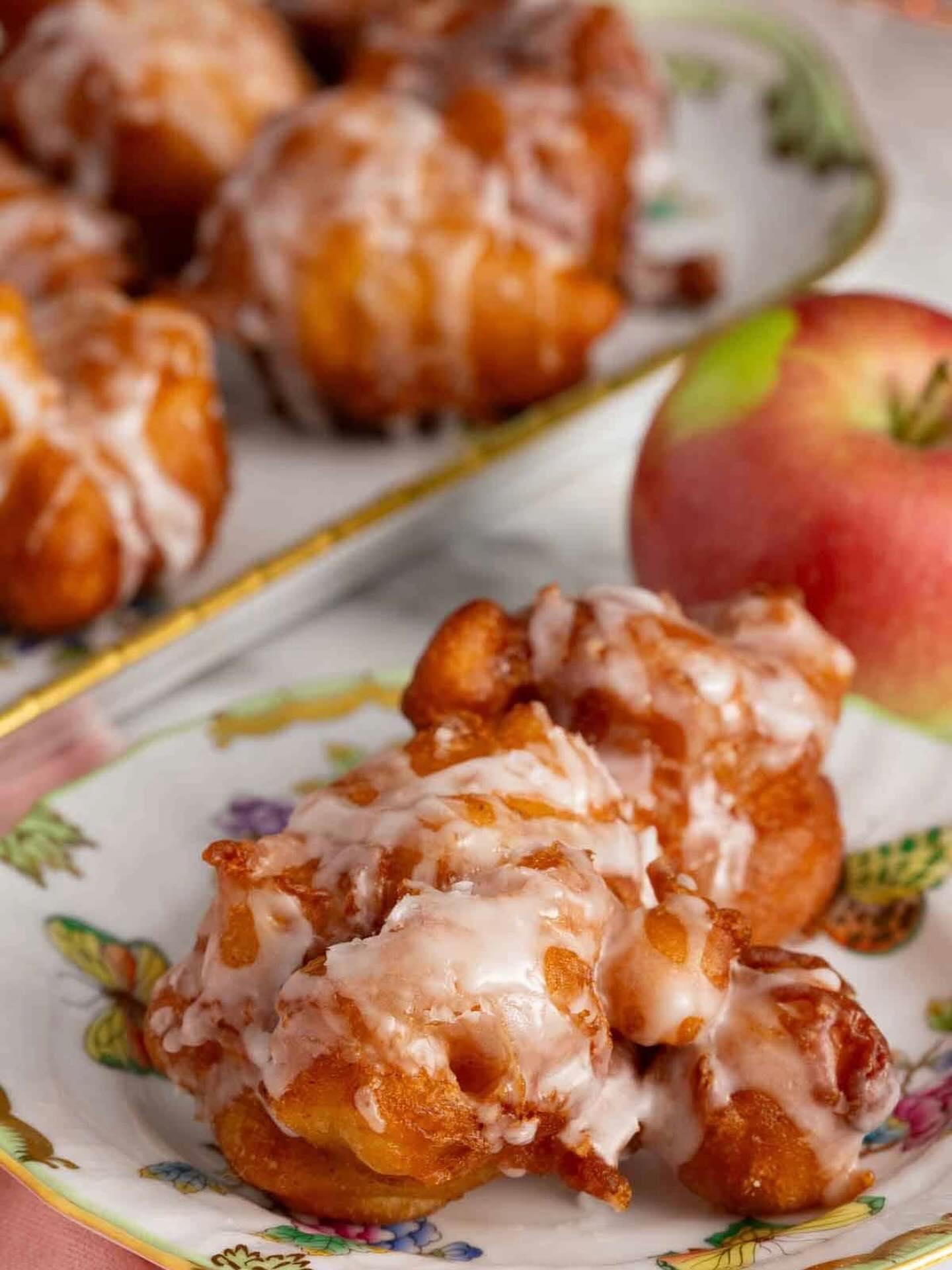 Cozy up with a warm apple fritter and a soothing cup of tea — the perfect pairing for any moment.