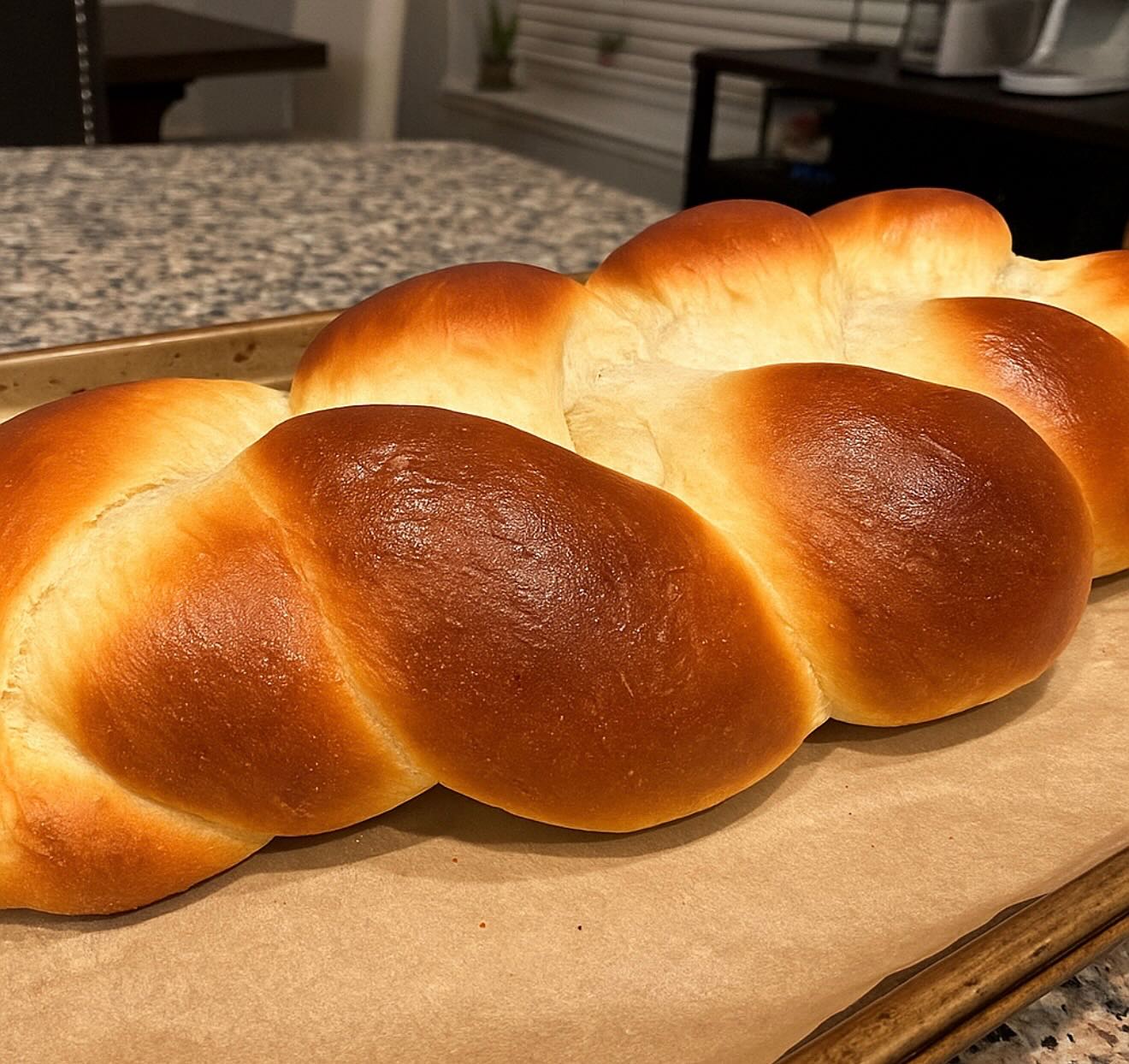 Oven-fresh challah, homemade and golden.